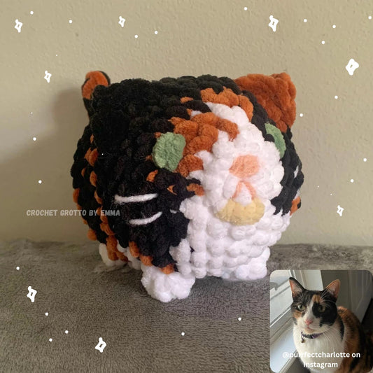 A custom cat pet plushie featuring calico markings!