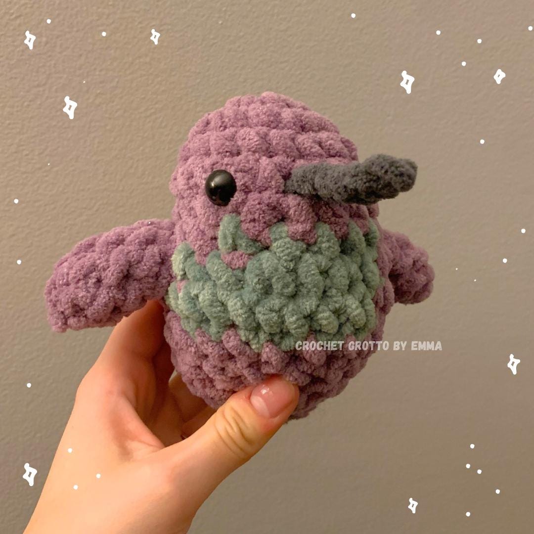 A crochet violet crowned woodnymph hummingbird plushie showing a diagonal right-side/front angle.